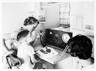 Queensland_State_Archives_2986_A_School_of_the_Air_primary_student_in_regional_Queensland_takes_class_via_two_way_radio_c_1960